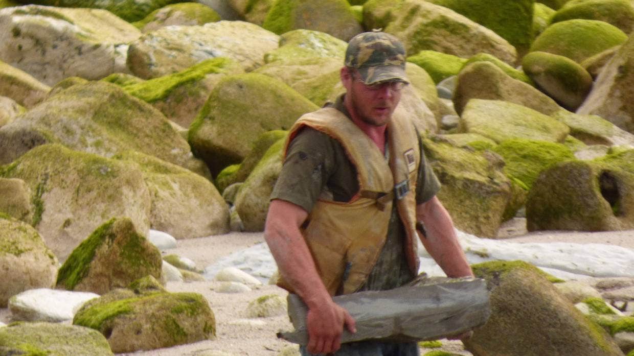 һȺ˻ѳƻӵ2300ʷ㻯ʯ